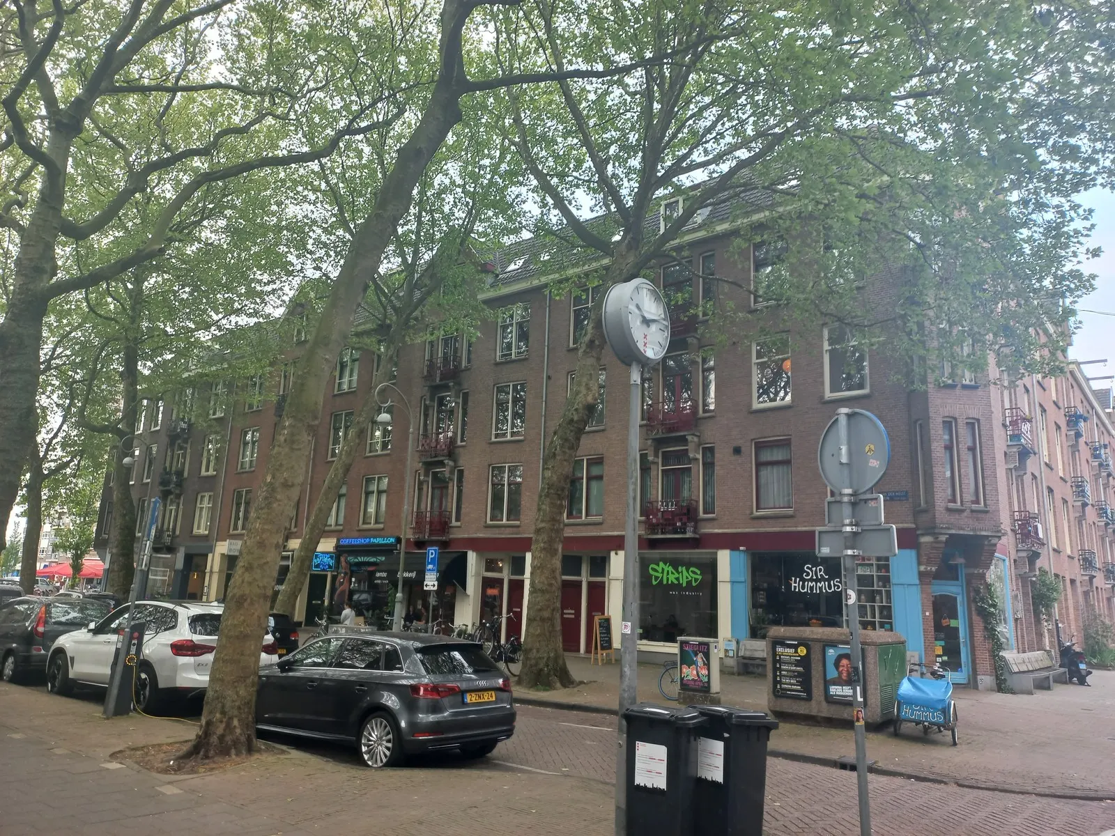 Coffeeshop Papillon neon storefront on Van der Helstplein, archival photograph.